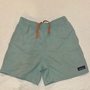 Patagonia Kids Swim Trunks in Light Blue with Orange Drawstring